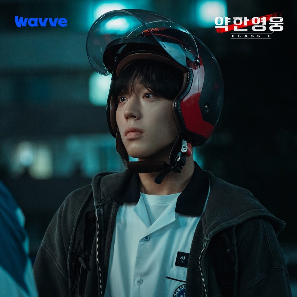 "Si-eun wearing Su-ho's helmet after finishing academy - a visual symbol of Su-ho's protection and care that extends beyond just physical safety. Source: Weak Hero Class 1, Wavve/Netflix"