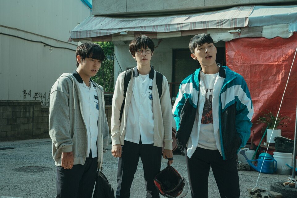"The trio of Si-eun, Su-ho, and Beom-seok standing side by side - a poignant image of their friendship at its peak before everything fell apart in Weak Hero Class 1. Source: Weak Hero Class 1, Wavve/Netflix"
