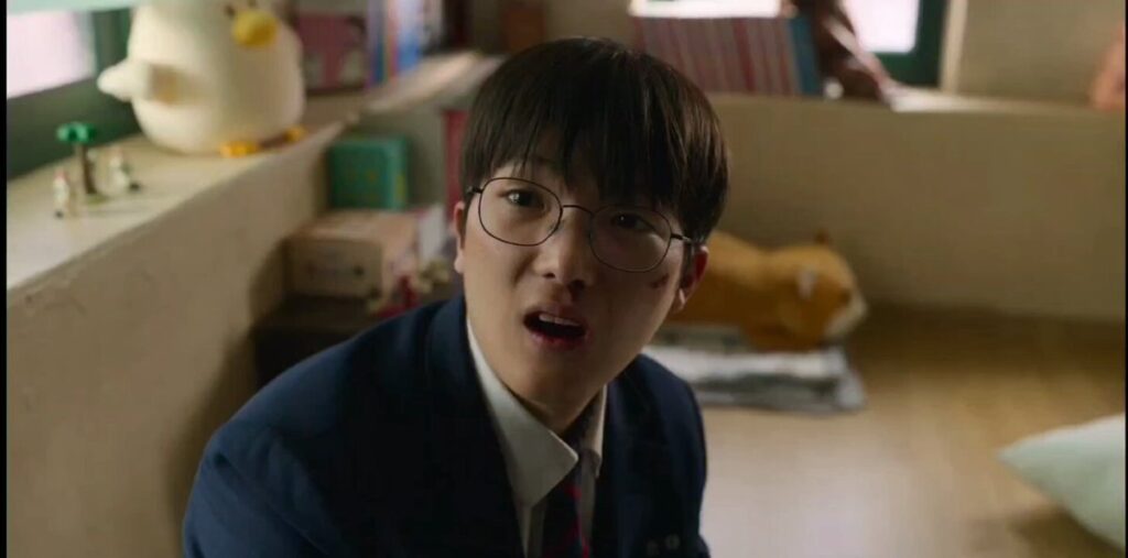 "Jun-tae with Si-eun in the manga club after getting beaten up by Hyo-man - finding comfort in quiet moments and new friendships despite the trauma. Source: Weak Hero Class 2, Netflix"