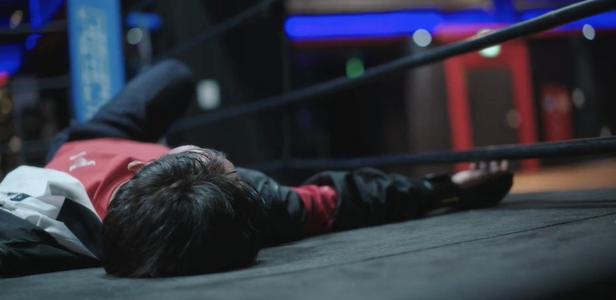 Su-ho lying unconscious in the ring after Beom-seok's devastating attack - a heartbreaking moment that changed the trajectory of all three friends' lives forever. Source: Weak Hero Class 1, Wavve/Netflix